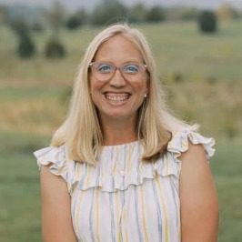 Dr. Ashley Mason - female with blonde hair and glasses