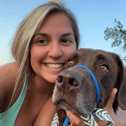 Cortlyn with her brown dog