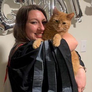 Hannah with her orange cat