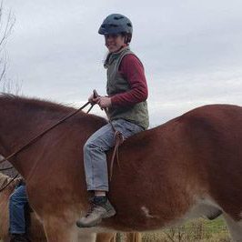 Dr. Bell riding a horse