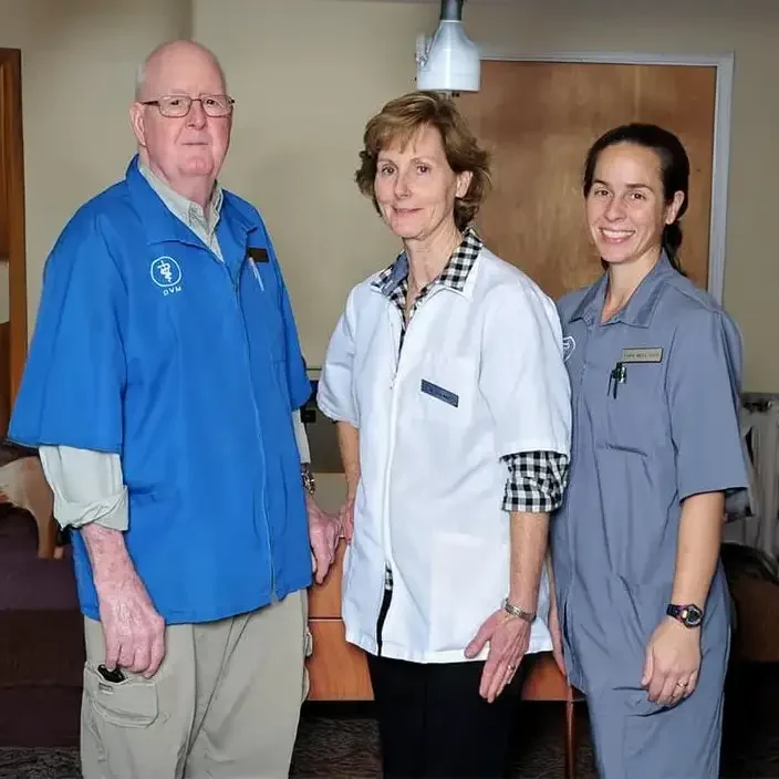 Veterinarians our veterinarians posing for a photo